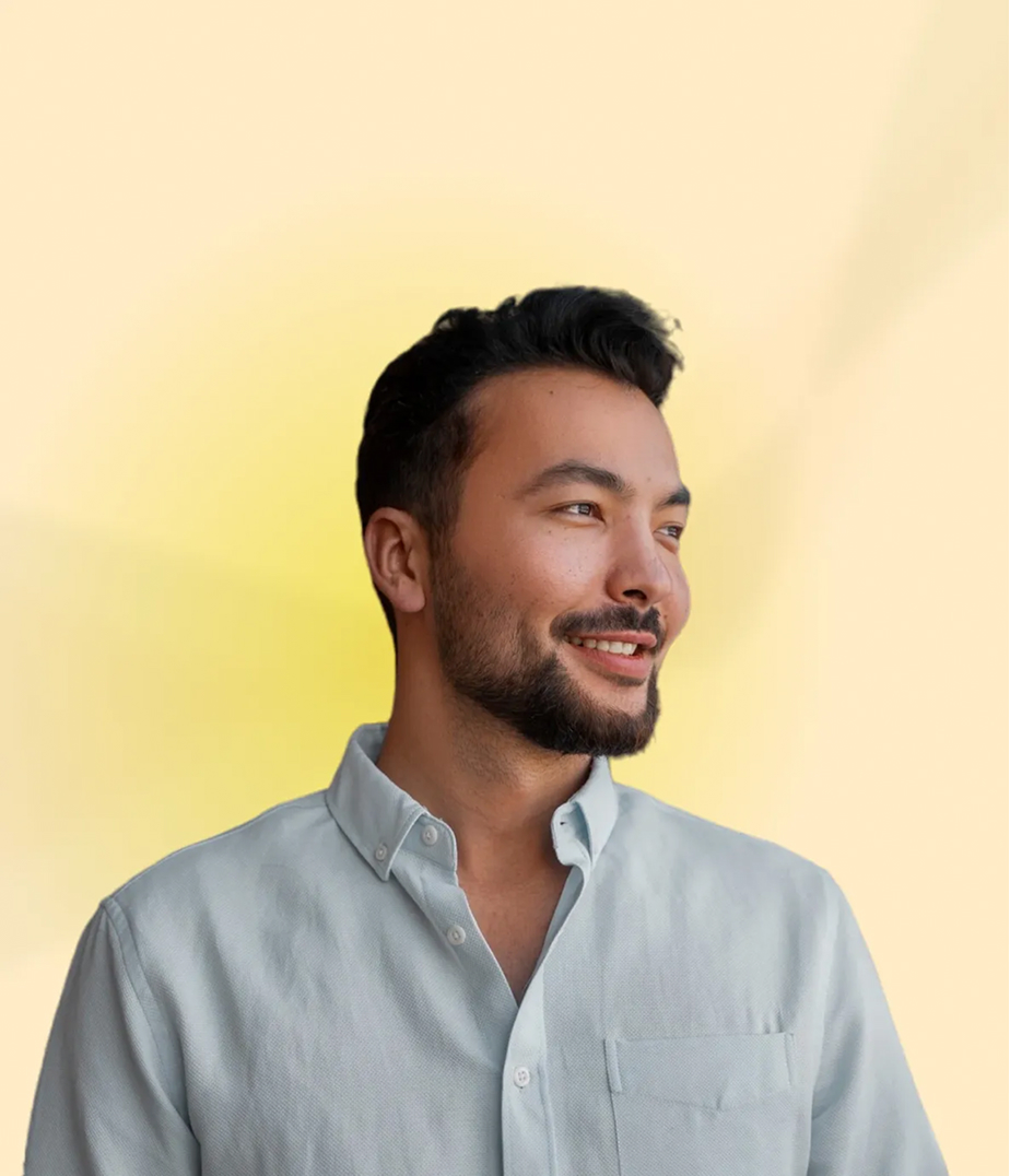 A patient smiling, thankful he received quality care.